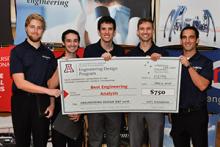 Team 15098 presents their big check for Best Engineering Analysis at Design Day 2016