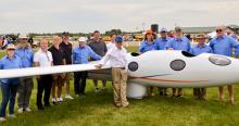 Ed Warnock, front, and the Perlan crew exhibit their glider at the Experimental Aircraft Association AirVenture show in July 2015 at Wittman Regional Airport in Oshkosh, Wisconsin; photo courtesy of Ed Warnock
