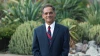 President Garimella poses outdoors on the University of Arizona campus