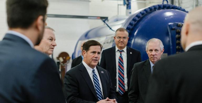 Governor Doug Ducey at UA's wind tunnel, with Wes Kremer, David Hahn, Robert Robbins, Alex Craig and Jesse Little.