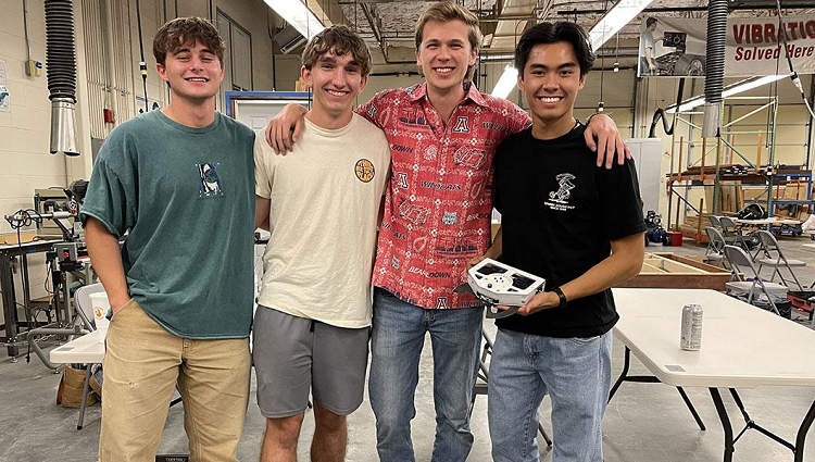 Members of the Wildcat Robotics’ “Liberator” team show off their BattleBot, which placed fifth in the Sonoran Showdown tournament on March 23. From left: Jarrod Smith, Mark Rutschow, Wolfgang Roettiger, Ben Nguyen. Photo: Wildcat Robotics