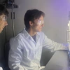 In biomedical engineering assistant professor Shang Song’s lab, undergraduates Ethan Taylor (left) and Lucas Mellinger stand by as a 3D bioprinter creates living cells.