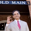 Suresh Garimella, 23rd president of the University of Arizona and a professor of aerospace and mechanical engineering, throws up a Bear Down in front of Old Main. 