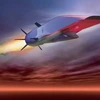 A silver vehicle flys through the sky.